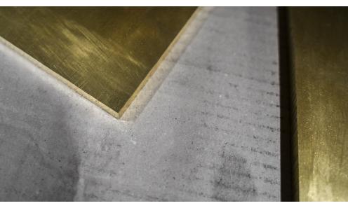 vlakkeplaat_messing_tegel